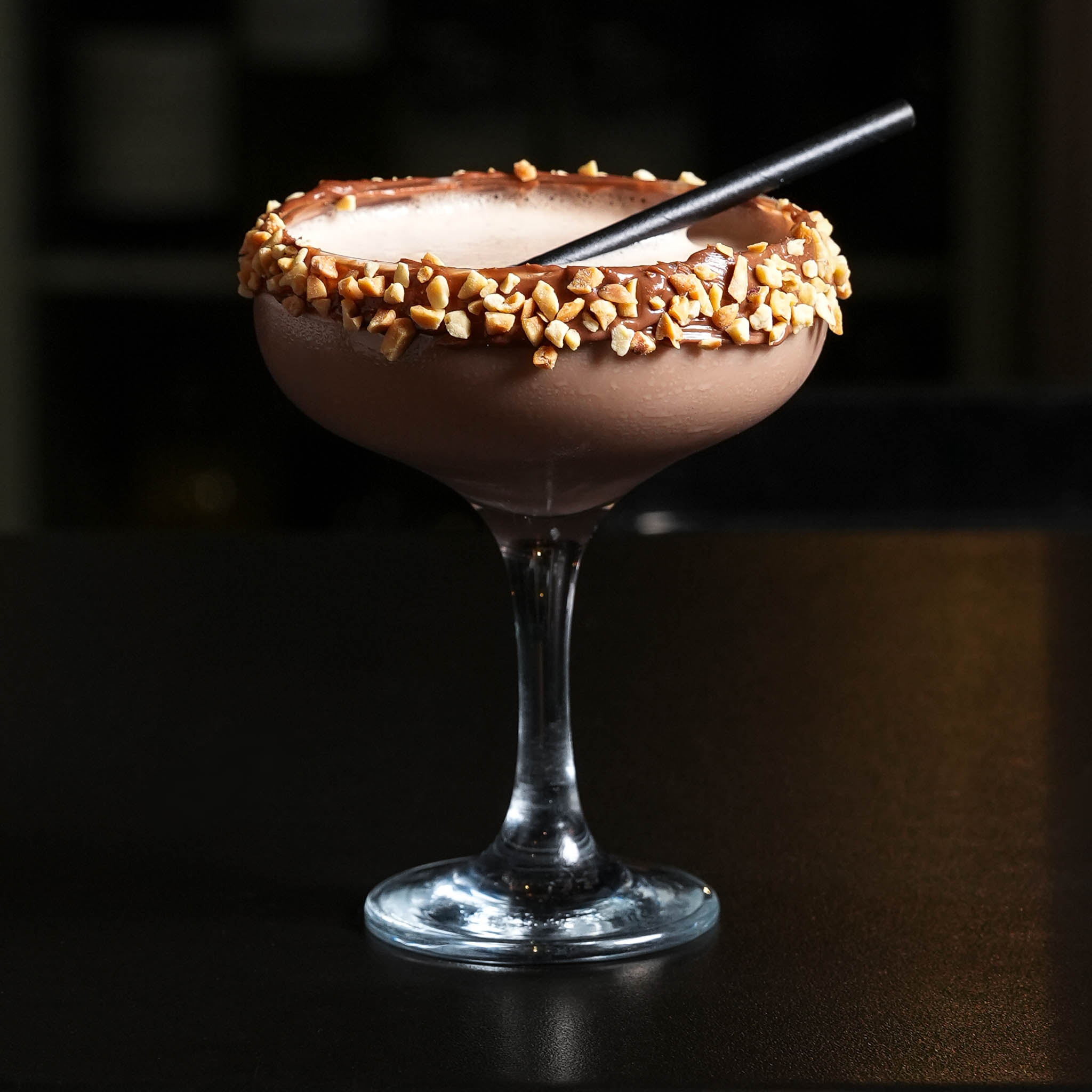 Ferrero Rocher Martini | Frangelico, Haku vodka, Baileys, Chocolate Syrup, Milk, Crushed Nuts & Nutella | $19